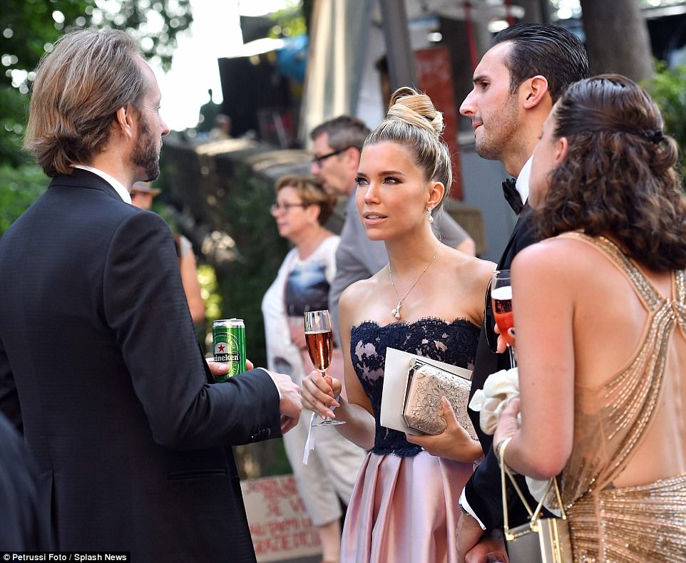 417ABE5A00000578-4622612-Guests_including_Sylvie_Meis_sipped_on_a_pink_champagne_and_beer-a-128_1497985528166
