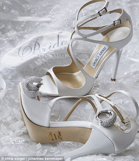 4195AB1100000578-4622612-The_bride_donned_a_white_pair_of_Jimmy_Choo_heels_embellished_wi-a-123_1497985527745